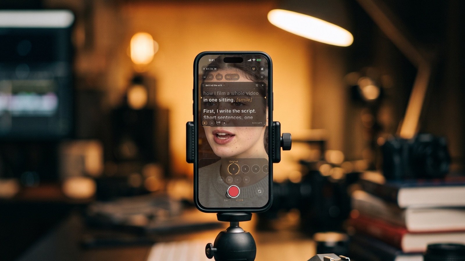 An iPhone on a tripod with CineCut's teleprompter by the lens
