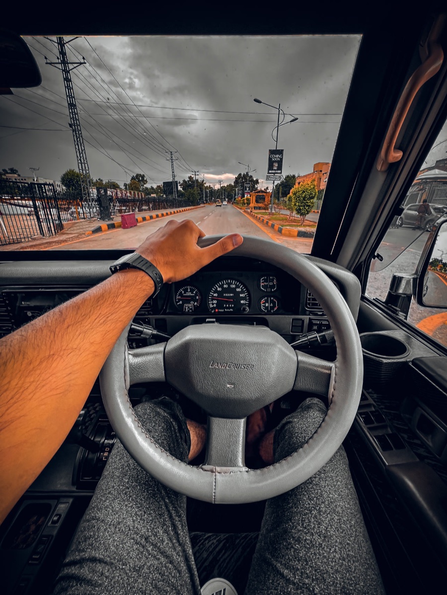 The Land Cruiser drive, graded with deep skies and warm tones